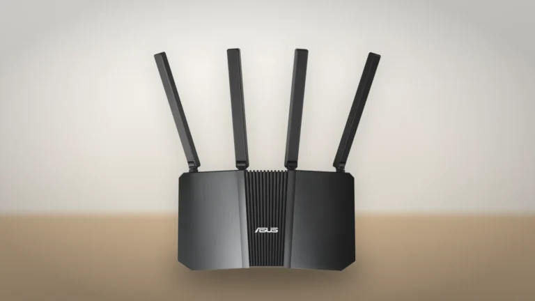 ASUS RT-BE82U seen straight on from the front on a desk, with the ASUS logo on its ribbed center panel